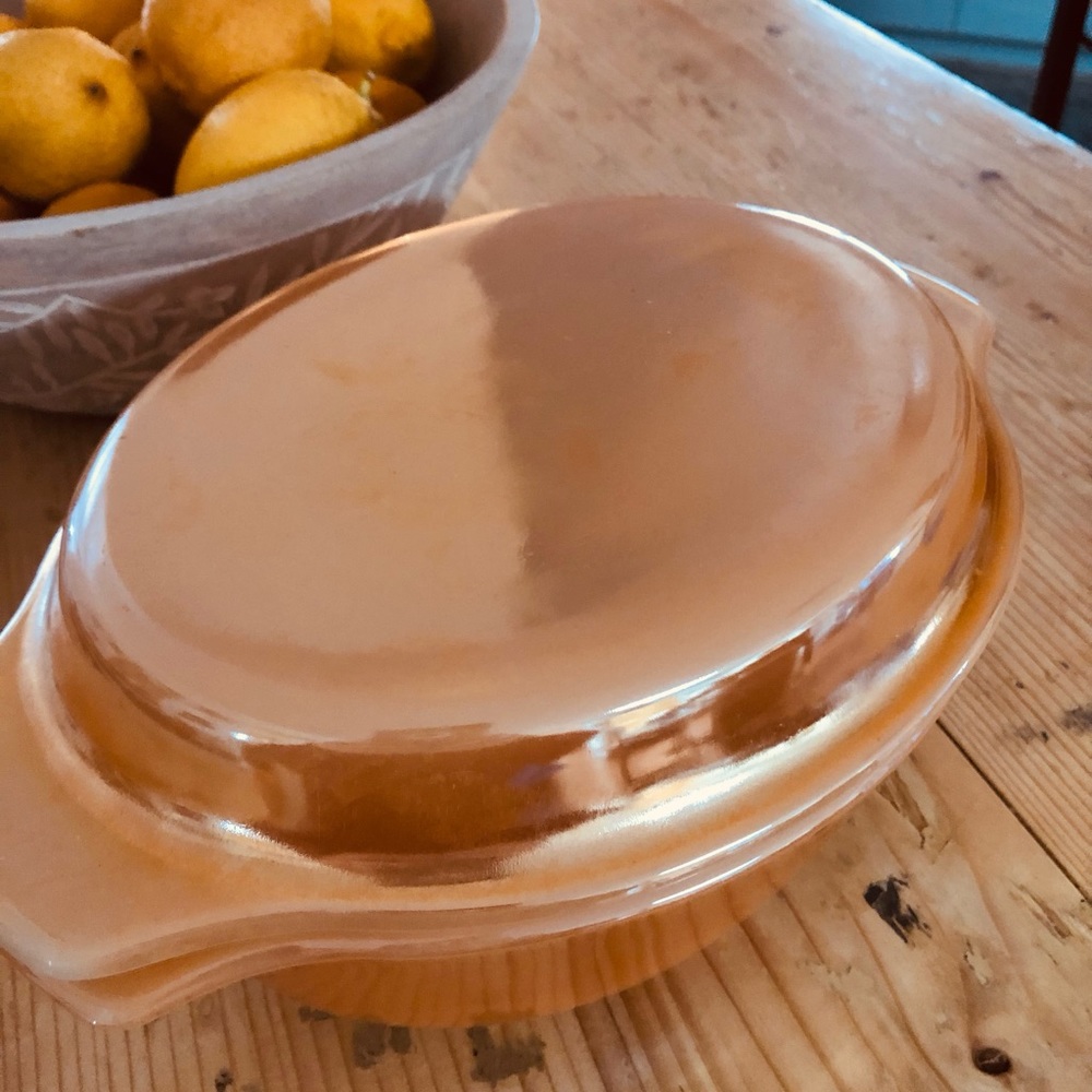 FIRE KING Peach Lustre Oval Casserole and Lid Vintage 1970’s MINT. 12” x 7.5”